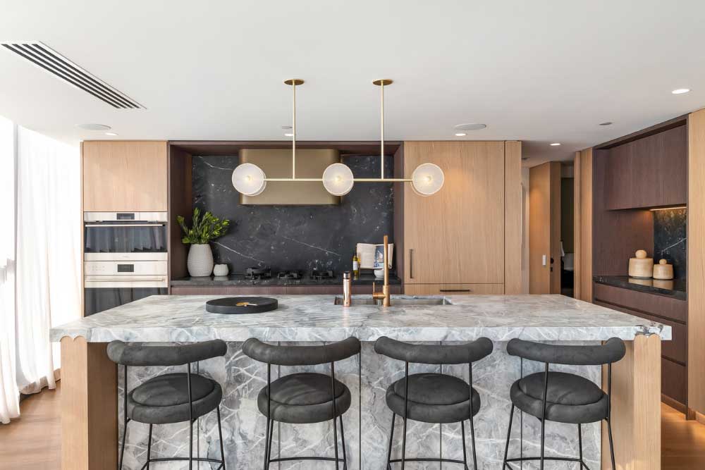 milson-2 A statement kitchen boasts double Wolf ovens, an integrated Sub Zero fridge, fitted Pitt gas cooktop plus a sparkling Billi tap.