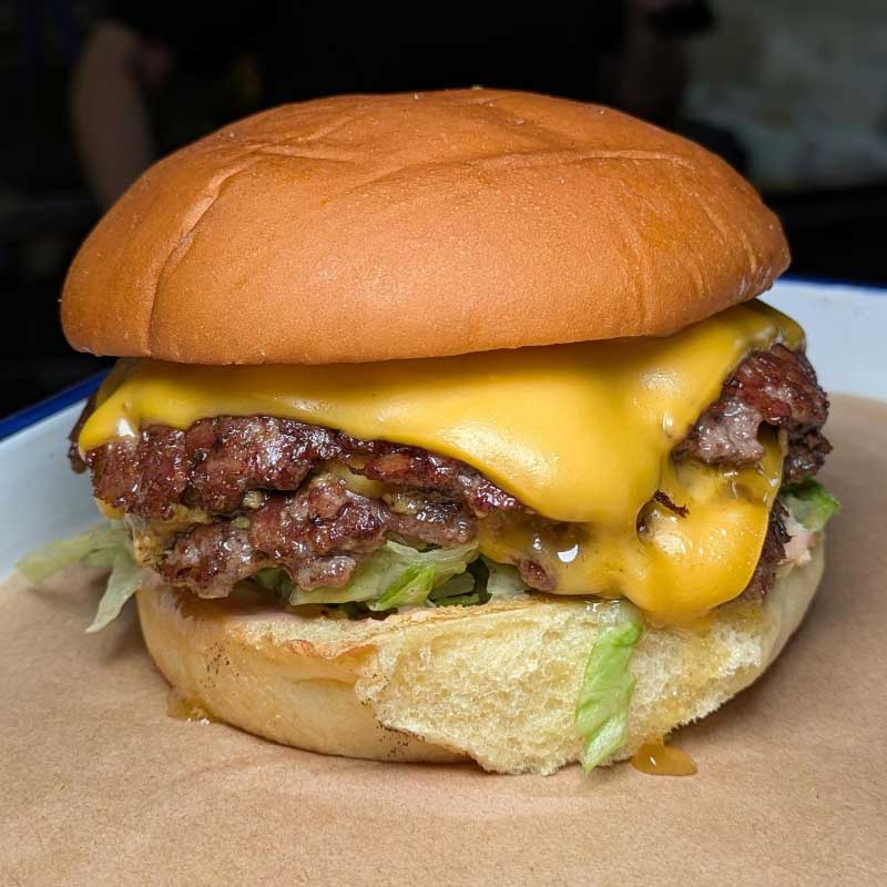 A double cheeseburger from Chico's, the taco bar moving to Rangers Rd in Neutral Bay.