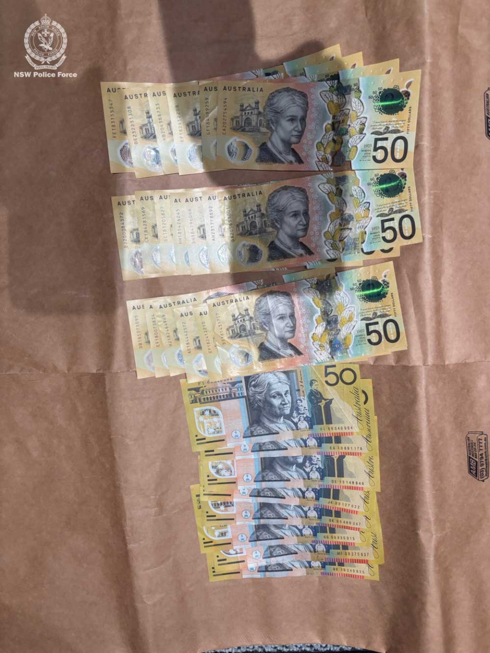 Cash allegedly seized at the scene by officers.