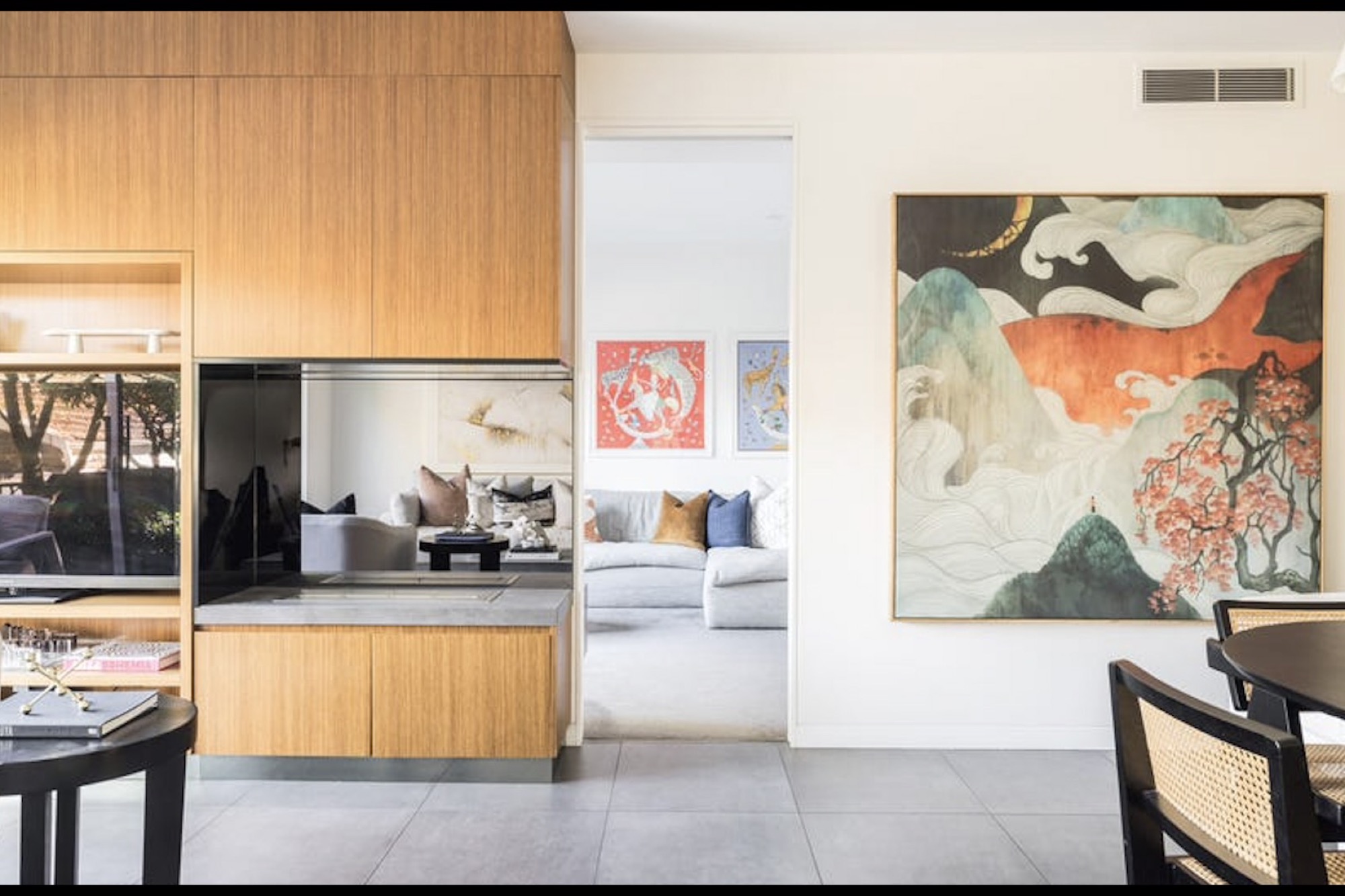 Screenshot Timber veneer joinery at 51 Young Lane, Cremorne, looking through to the separate living zone.