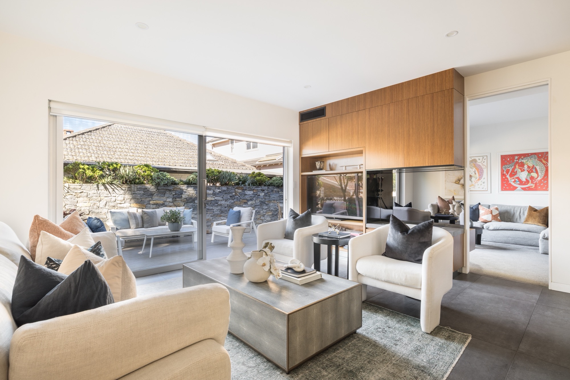 51-young-lane-cremorne-living-zone-terrace The separate living zone at 51 Young Lane, Cremorne, with glass sliding doors to the terrace.