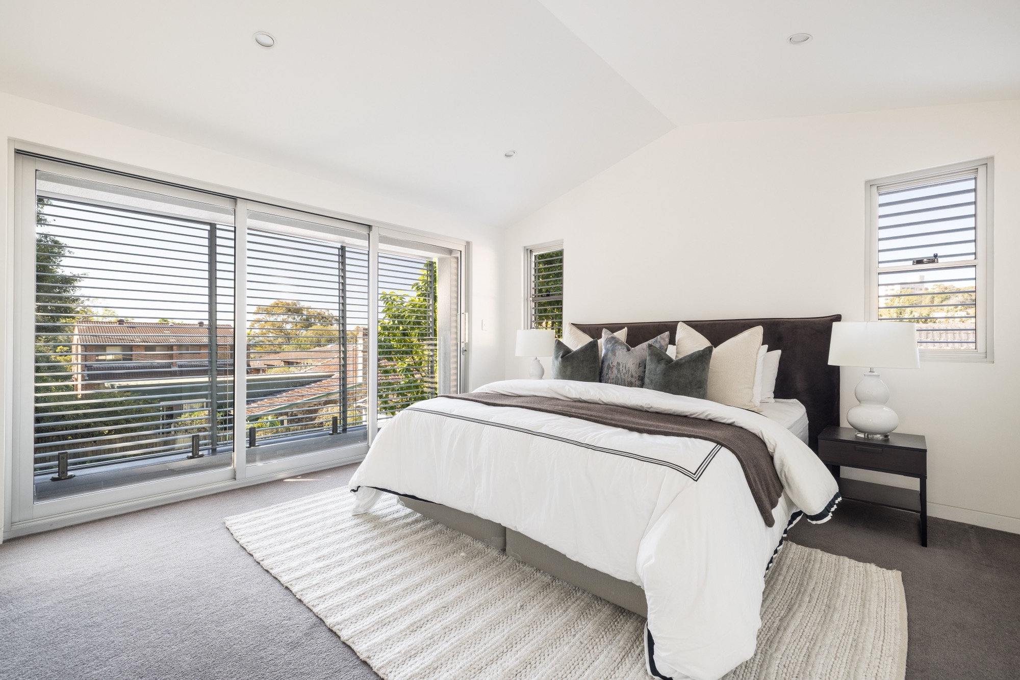 51-young-lane-cremorne-master-bedroom-suite The master bedroom at 51 Young Lane, Cremorne, opening to its own terrace.