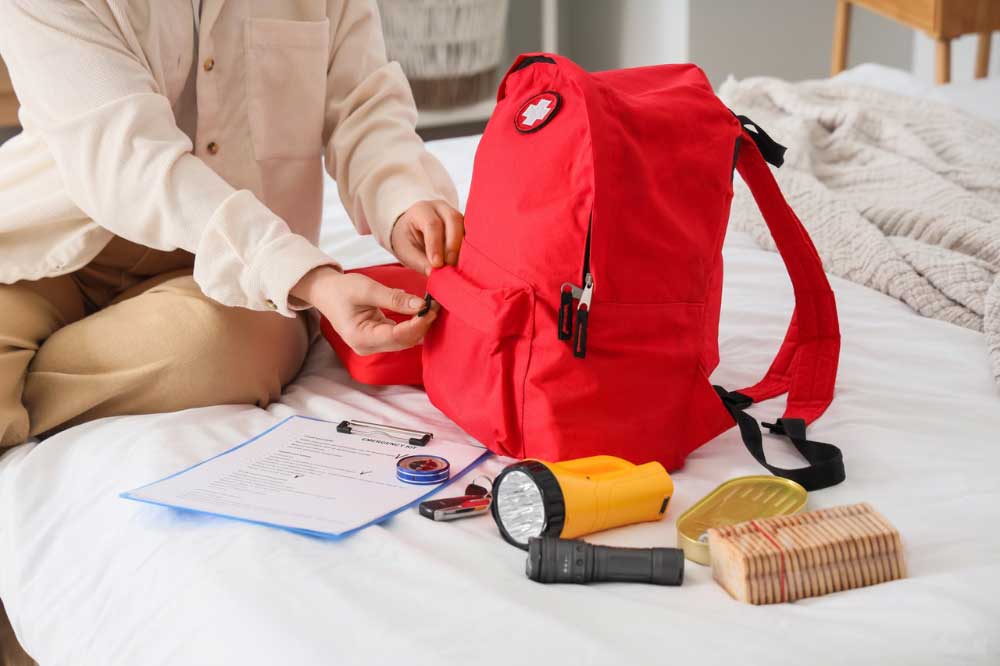Women packing her emergency bag
