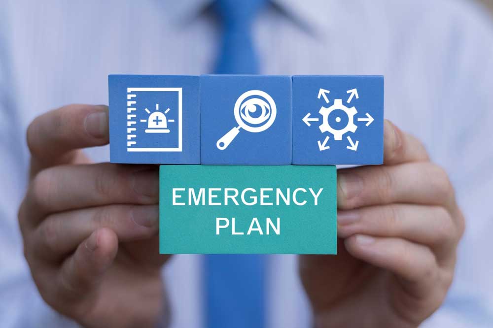 Person holding emergency icons
