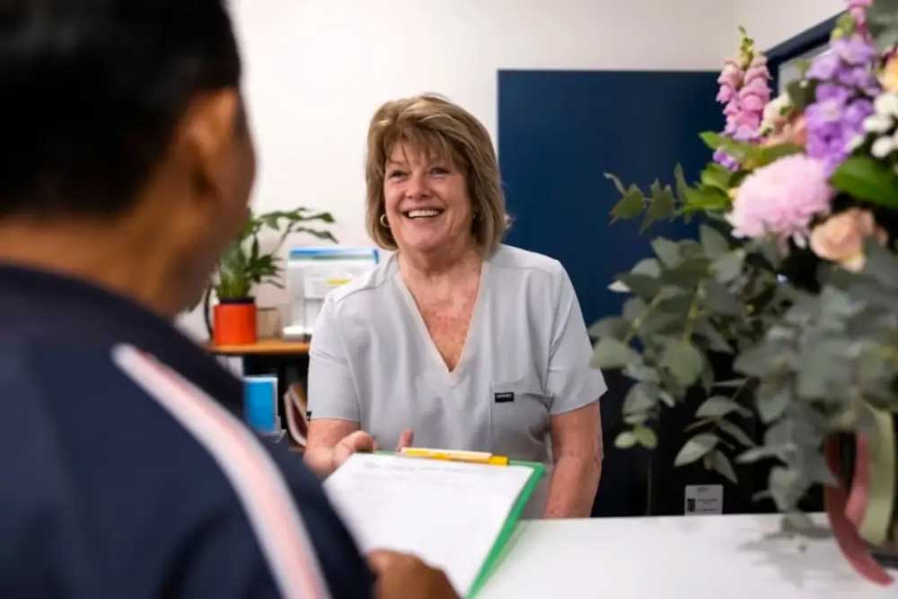 Doctor consulting female patient