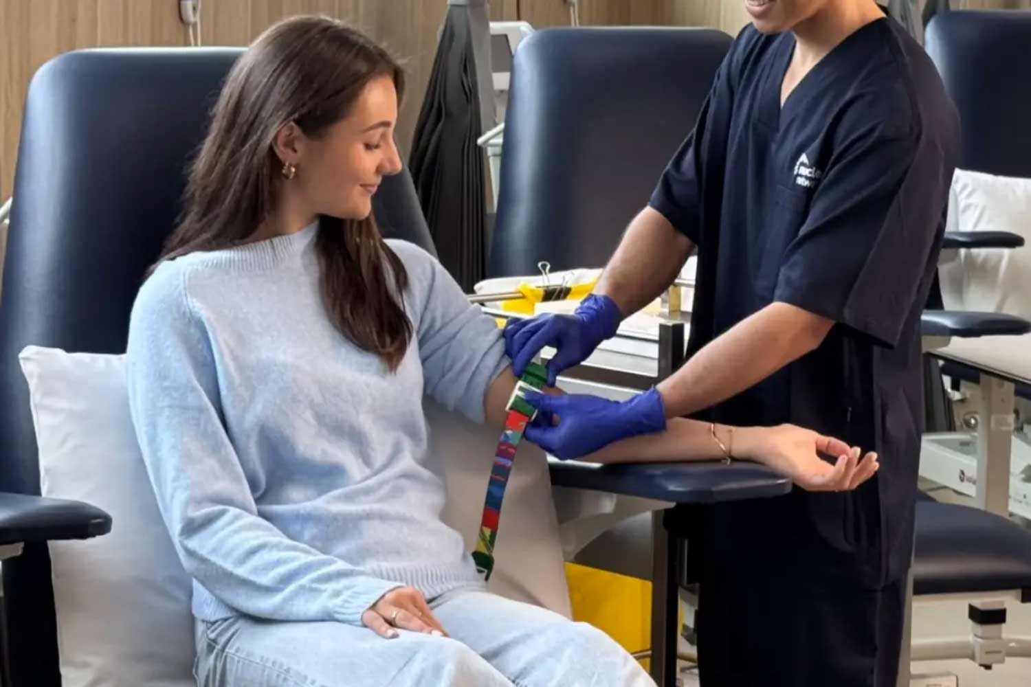 Woman having blood pressure test