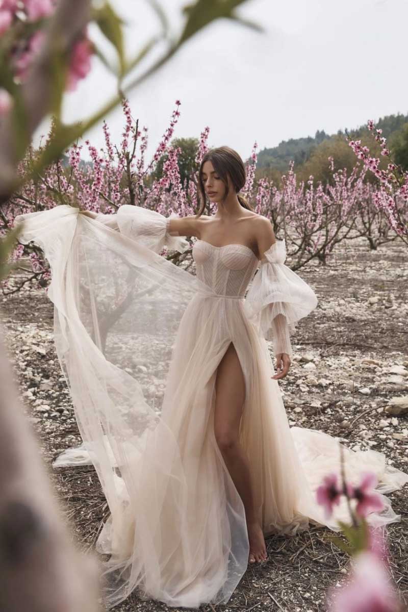 Bride outside dressed in white dress