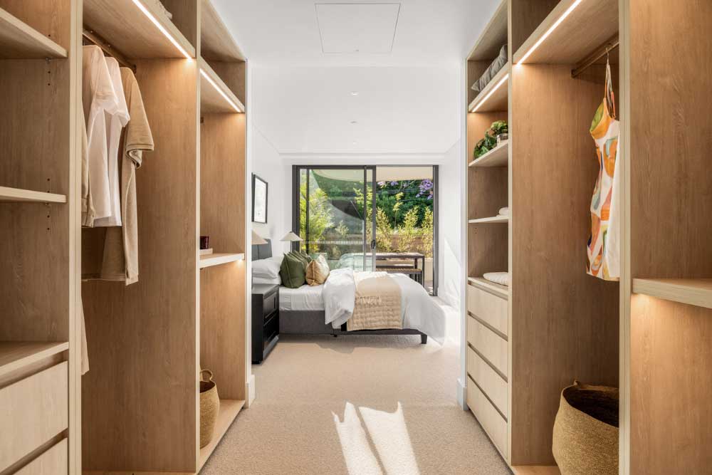 walk in wardrobe looking into main bedroom