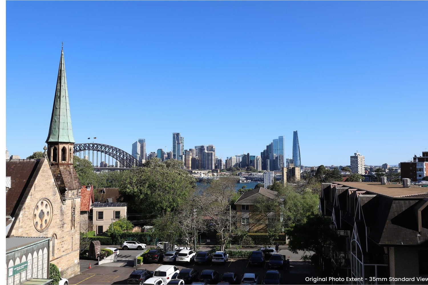 Looking south from Blue Street Plaza today, with St Francis Xavier Church and the Sydney Harbour Bridge behind it.
