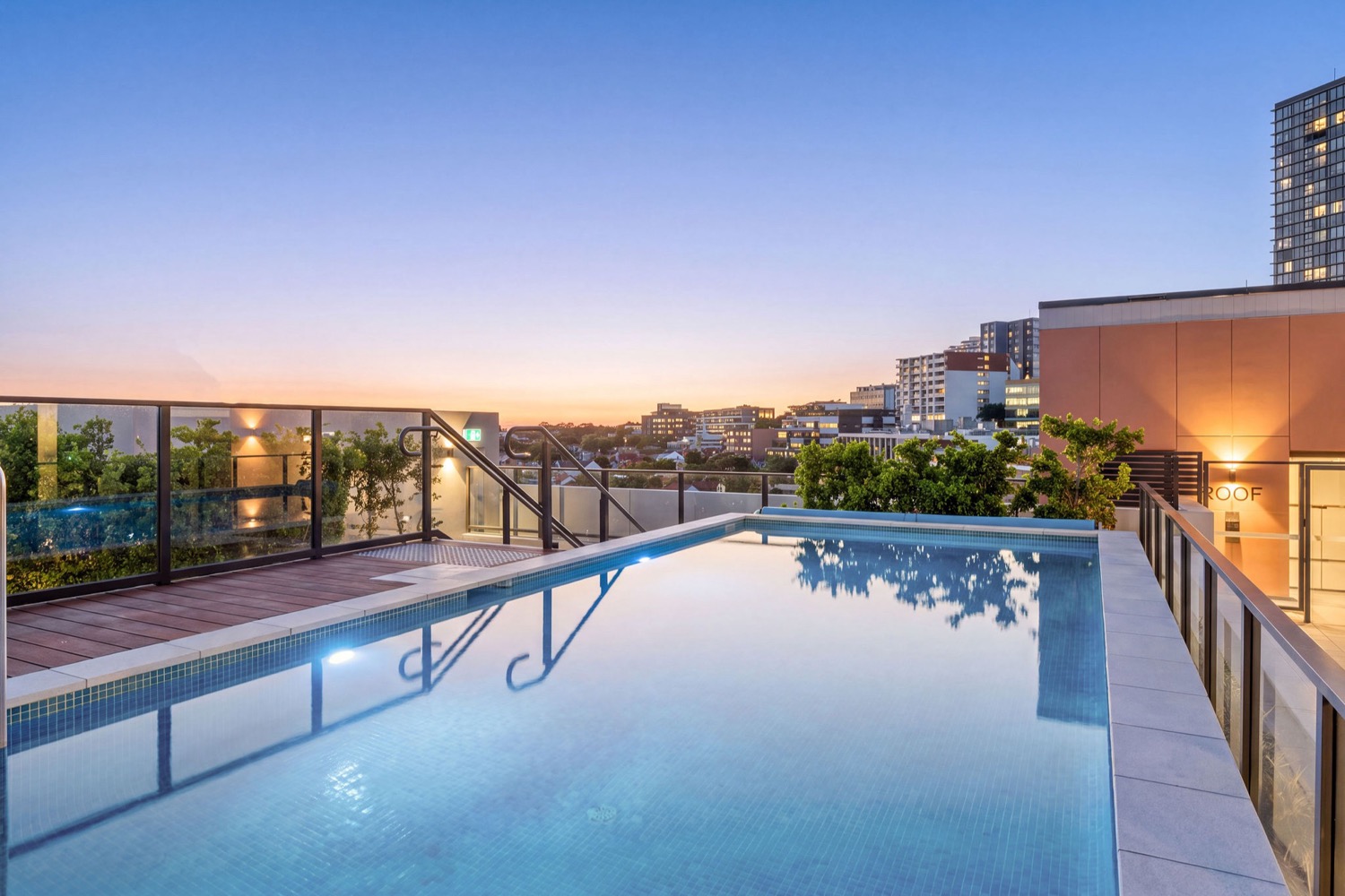 Rooftop swimming pool at Northcote Collective, Naremburn, at sunset.