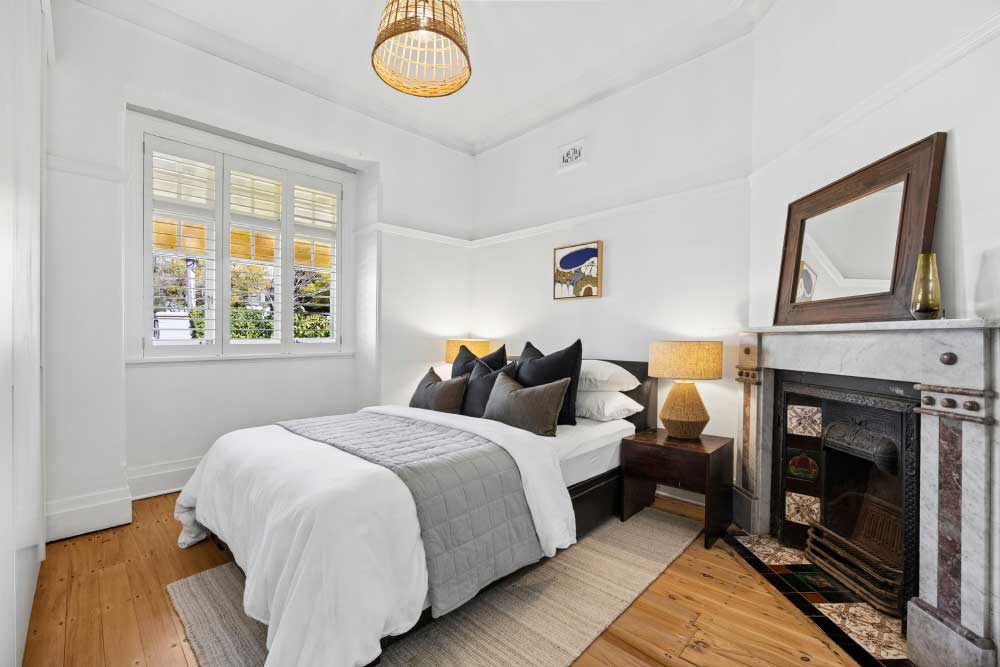 Bedrooms feature original fireplaces and built ins The bedrooms feature original fireplaces and built ins