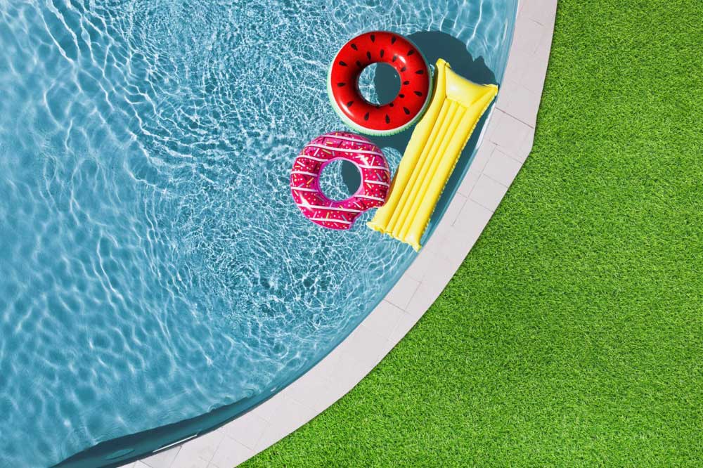Ariel of swmming Pool with blow up donuts